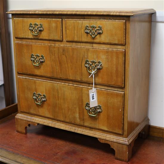 A walnut small chest W.58cm